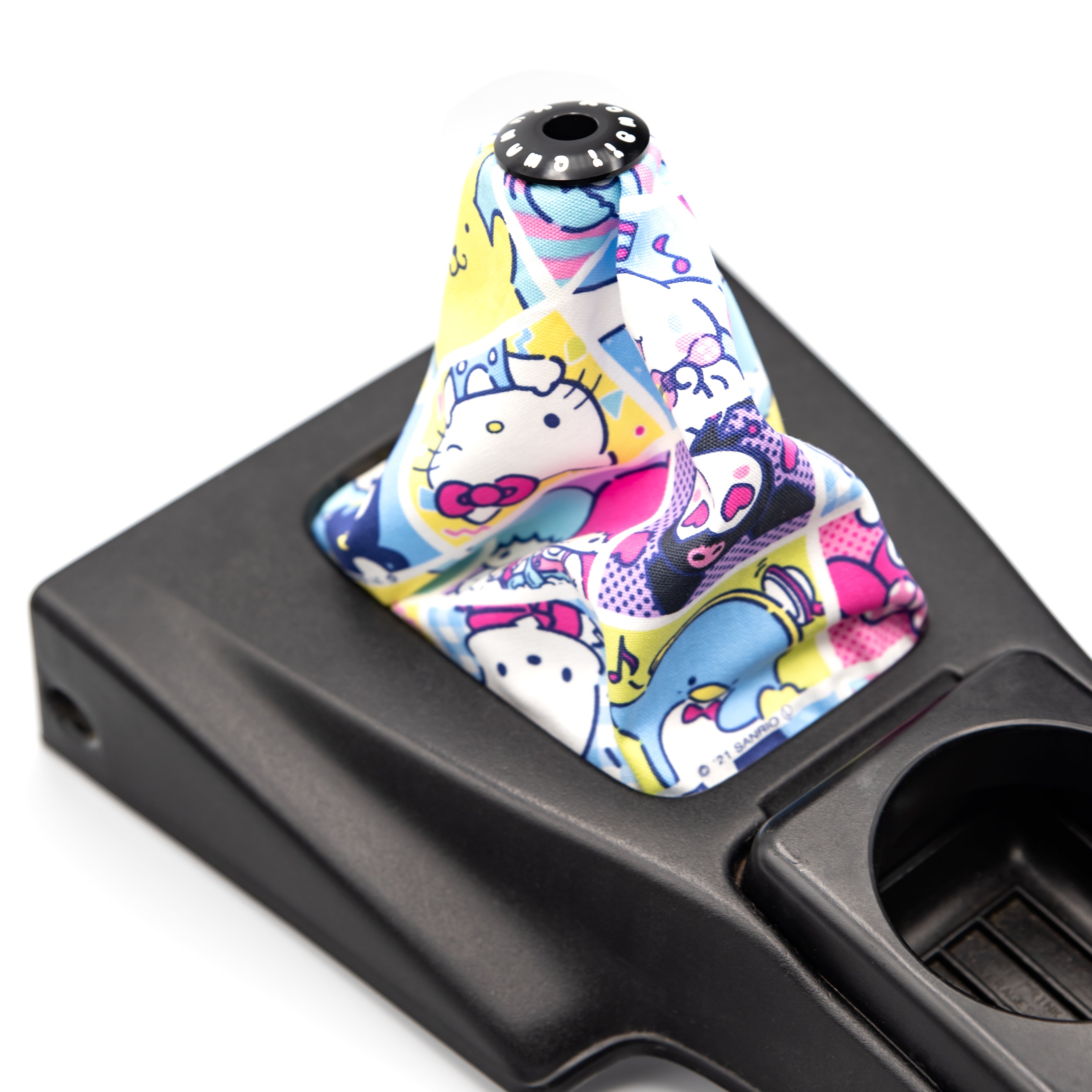 cute and colourful sanrio themed shiftboot covers. In miata center console